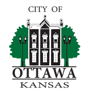 Speed bumps in your parking lot Ottawa Kansas City Logo